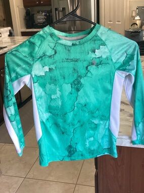 Reel Legends Kids Long-Sleeve Rashguard in Teal Marble with White Panels